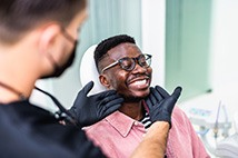 Man smiling at the dentist